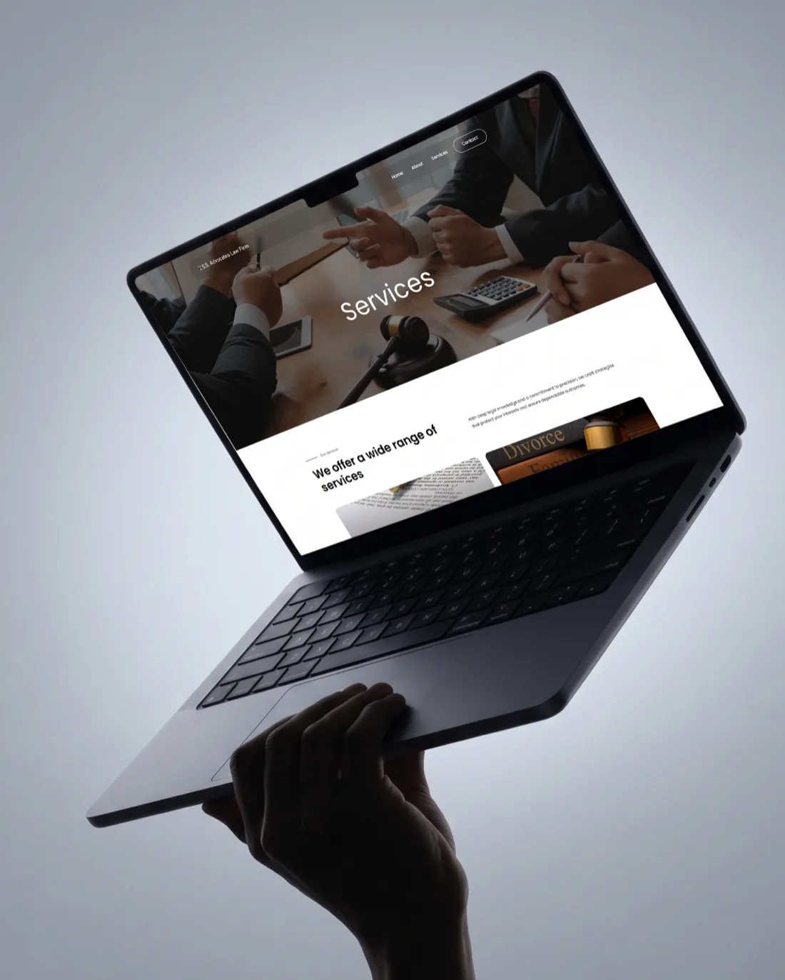 SS Advocates services page on a laptop